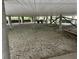 Gravel area under the house, providing ample storage space at 56633 Otter Rd, Astor, FL 32102