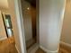 Small walk-in shower with stone walls at 56633 Otter Rd, Astor, FL 32102