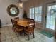 Bright dining room with wood table and chairs at 56633 Otter Rd, Astor, FL 32102