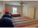 Guest bedroom with two beds and ceiling fan at 56633 Otter Rd, Astor, FL 32102