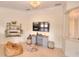Gathering room featuring a large TV and comfortable seating at 4818 Se 11Th Pl, Ocala, FL 34471