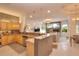 Open concept kitchen boasting granite countertops, stainless steel appliances, and an island at 4818 Se 11Th Pl, Ocala, FL 34471