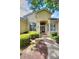 House entrance with walkway and landscaping at 4818 Se 11Th Pl, Ocala, FL 34471