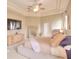 Main bedroom with a king-size bed, large TV, and plenty of closet space at 4818 Se 11Th Pl, Ocala, FL 34471