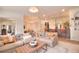 Spacious living room with comfortable seating and a modern aesthetic at 4818 Se 11Th Pl, Ocala, FL 34471