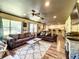 Spacious living room with hardwood floors, fireplace and open floor plan at 5401 Se 162Nd St # 32, Summerfield, FL 34491