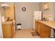 Small kitchen with wood cabinets and a stove at 5401 Se 162Nd St # 32, Summerfield, FL 34491