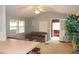 Simple living room with a couch and access to a deck at 5401 Se 162Nd St # 32, Summerfield, FL 34491