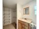 Bathroom with vanity, toilet, and storage at 5401 Se 162Nd St # 32, Summerfield, FL 34491