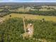 Aerial view of a rural property with a home and surrounding land at 5401 Se 162Nd St # 32, Summerfield, FL 34491