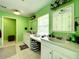 Clean bathroom with double vanity and a large mirror at 5401 Se 162Nd St # 32, Summerfield, FL 34491