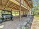 Covered parking area for vehicles, with additional storage space at 5401 Se 162Nd St # 32, Summerfield, FL 34491