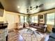 Comfortable living room featuring hardwood floors and ample natural light at 5401 Se 162Nd St # 32, Summerfield, FL 34491