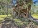 Two-story house with a wooden exterior and landscaped yard at 5401 Se 162Nd St # 32, Summerfield, FL 34491