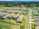 Aerial view of a residential neighborhood with houses and streets at 8857 Sw 50Th Ter, Ocala, FL 34476