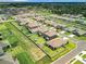Aerial view of a residential neighborhood with houses and streets at 8857 Sw 50Th Ter, Ocala, FL 34476