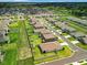 Aerial view of Greystone Hills community, showcasing homes and landscape at 8857 Sw 50Th Ter, Ocala, FL 34476