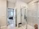 Bathroom with a walk-in shower and view of bedroom at 8857 Sw 50Th Ter, Ocala, FL 34476
