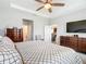 Spacious Primary bedroom with a dresser and kitchen view at 8857 Sw 50Th Ter, Ocala, FL 34476