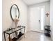 Bright entryway with a console table and mirror at 8857 Sw 50Th Ter, Ocala, FL 34476