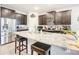 Modern kitchen with granite island and stainless steel appliances at 8857 Sw 50Th Ter, Ocala, FL 34476