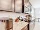Well-equipped kitchen with granite countertops and modern appliances at 8857 Sw 50Th Ter, Ocala, FL 34476
