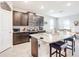 Modern kitchen with granite countertops and stainless steel appliances at 8857 Sw 50Th Ter, Ocala, FL 34476
