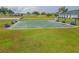 Community shuffleboard courts with benches at 5495 Nw 23Rd Pl, Ocala, FL 34482