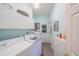 Laundry room with washer, dryer, and ample storage cabinets at 5495 Nw 23Rd Pl, Ocala, FL 34482