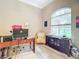 Bright home office with large window and built-in desk at 6615 Se 158Th Pl # 6, Summerfield, FL 34491