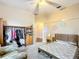 Charming bedroom with a bed, closet, and sitting area at 6615 Se 158Th Pl # 6, Summerfield, FL 34491