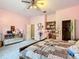 Bright bedroom featuring a comfy bed and ample storage at 6615 Se 158Th Pl # 6, Summerfield, FL 34491