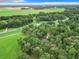 Aerial view of property near road and green pastures at 6615 Se 158Th Pl # 6, Summerfield, FL 34491