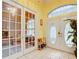 Bright entryway with double French doors and elegant double entry doors at 6615 Se 158Th Pl # 6, Summerfield, FL 34491