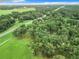 Aerial view of property showing home and lush landscape at 6615 Se 158Th Pl # 6, Summerfield, FL 34491