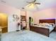 Spacious bedroom with large bed, dresser, and walk-in closet at 6615 Se 158Th Pl # 6, Summerfield, FL 34491