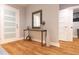 Bright entryway with console table and mirror at Tbd Bay Ct, Ocklawaha, FL 32179
