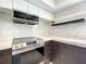 Modern kitchen with stainless steel appliances and marble backsplash at 4612 Bradley Ave, Orlando, FL 32839