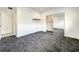Bright bedroom with mirrored closet and gray carpeting at 4612 Bradley Ave, Orlando, FL 32839