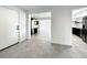 Modern entryway with gray tile floor and view into the living area at 4612 Bradley Ave, Orlando, FL 32839