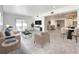 Modern living room features neutral decor and open floor plan at 4612 Bradley Ave, Orlando, FL 32839