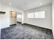 Spacious bedroom with mirrored closet and gray carpeting at 4612 Bradley Ave, Orlando, FL 32839