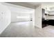Open concept living room features a modern kitchen with marble countertops at 4612 Bradley Ave, Orlando, FL 32839