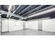 Finished garage with epoxy floor and extra storage at 4612 Bradley Ave, Orlando, FL 32839
