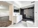 Modern bathroom with double vanity, dark tile shower and toilet at 4612 Bradley Ave, Orlando, FL 32839