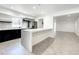 Modern kitchen with marble island and stainless steel appliances at 4612 Bradley Ave, Orlando, FL 32839