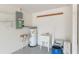 Well-lit garage with washer, water heater, and ample storage at 2260 Nw 51St Ter, Ocala, FL 34482