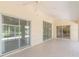 Large screened porch with access to the backyard and kitchen at 2260 Nw 51St Ter, Ocala, FL 34482