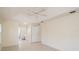 Bright bedroom with tile floors and access to a bathroom at 2260 Nw 51St Ter, Ocala, FL 34482