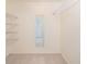 Closet with wire shelving and a full-length mirror at 2260 Nw 51St Ter, Ocala, FL 34482